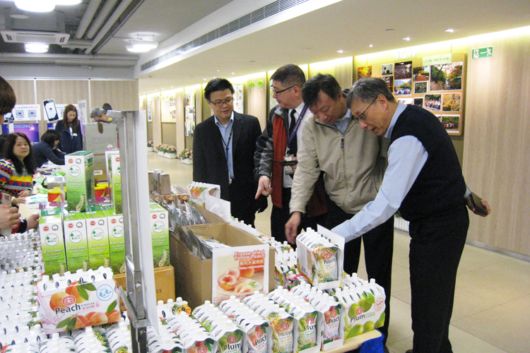 Colleagues choosing the health products on the Health Day    