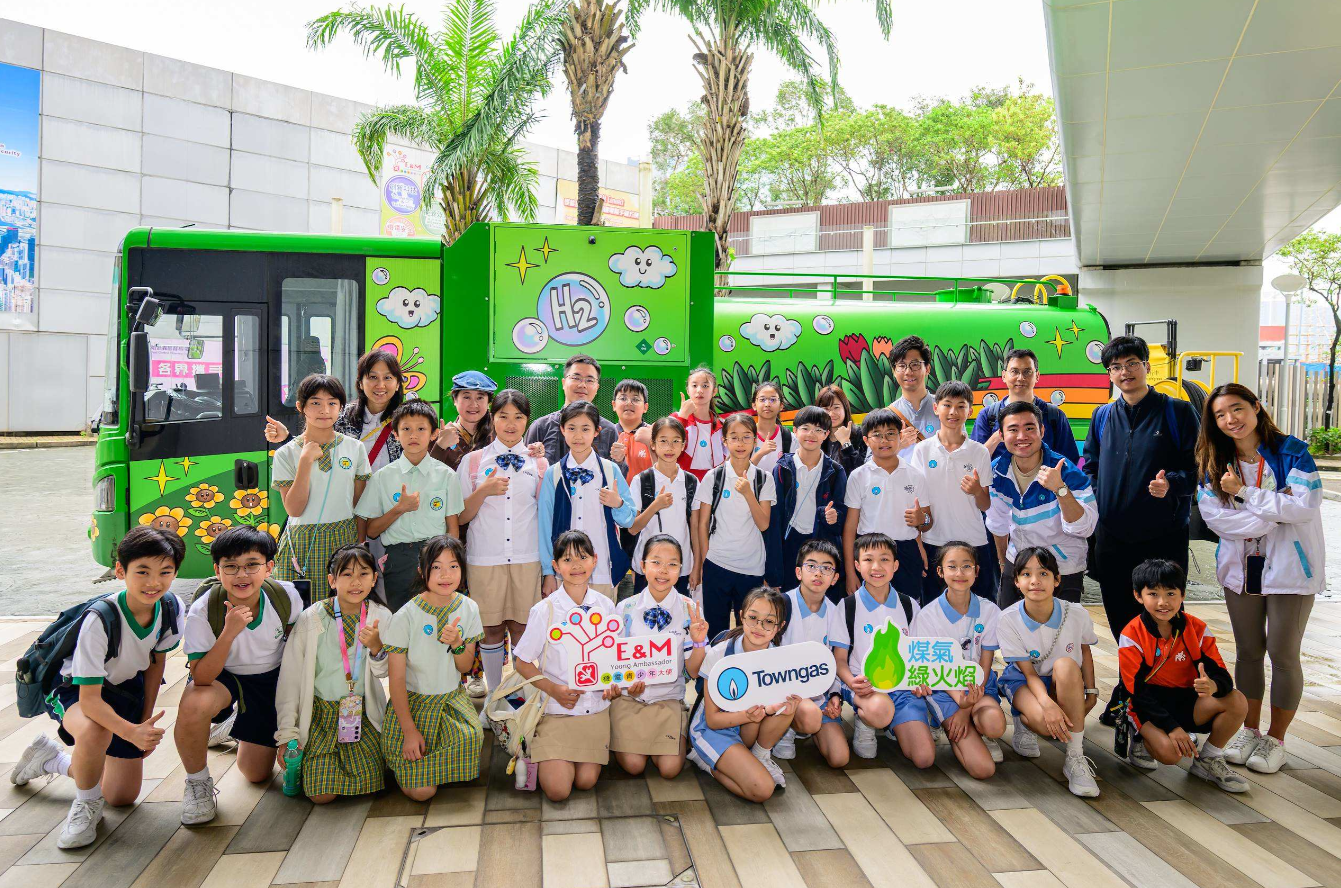 Participants visit the EMSD Headquarters to study the operation of a hydrogen fuel cell street washing vehicle.